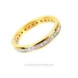 A Yellow Gold and Diamond Set Eternity ring