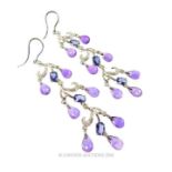 A boxed pair of 18 ct white gold, diamond, amethyst and iolite earrings