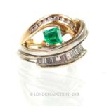 An Emerald and Diamond ring