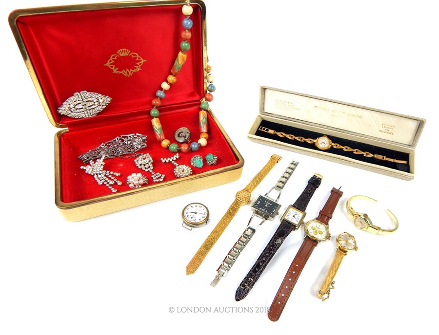 A collection of costume jewellery and watches