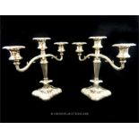 A pair of English silver plated candelabra