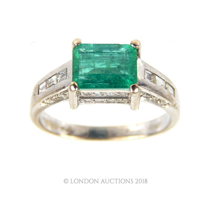 An Emerald and Diamond ring