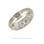 A white gold and diamond full eternity ring