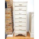 A vintage 1940's grey painted and distressed tall chest of eight drawers