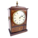 A Regency mahogany and brass inlaid bracket clock