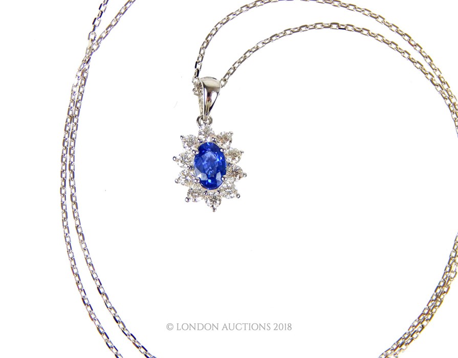 An 18 Carat White Gold Sapphire and Diamond Pendant Necklace on gold chain - Image 3 of 3