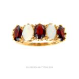A Vintage Opal and Garnet five stone ring