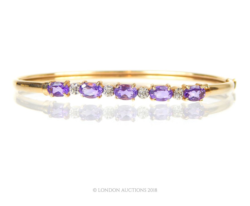 An Amethyst diamond bangle