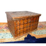 An antique Indian hardwood and iron bound chest