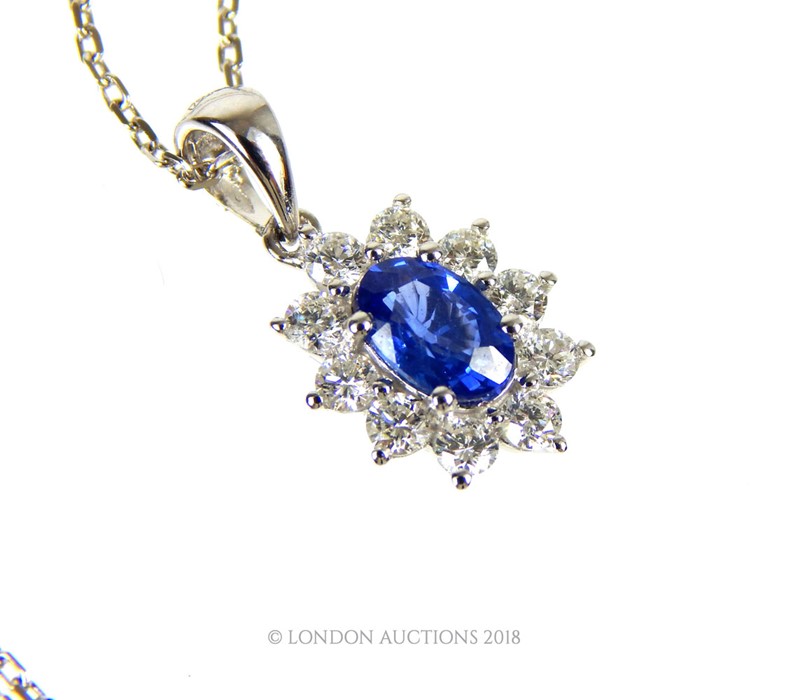 An 18 Carat White Gold Sapphire and Diamond Pendant Necklace on gold chain - Image 2 of 3