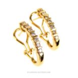 A pair of 14 Carat Yellow Gold Half Loop Earrings.