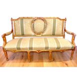 A mid 20th century French style giltwood sofa