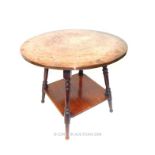 A late Victorian Arts & Crafts table, with a copper circular top