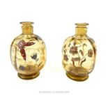 A pair of 19th century hand blown glass scent bottles