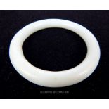 A Chinese jade coloured bangle