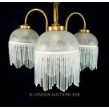 An Edwardian style gilt metal hanging light