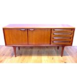 A 1960's / 70's Younger teak sideboard, Danish in style