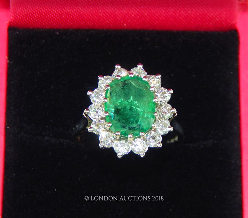 A good 18 Carat White Gold Emerald and Diamond Cluster Ring. - Image 4 of 4