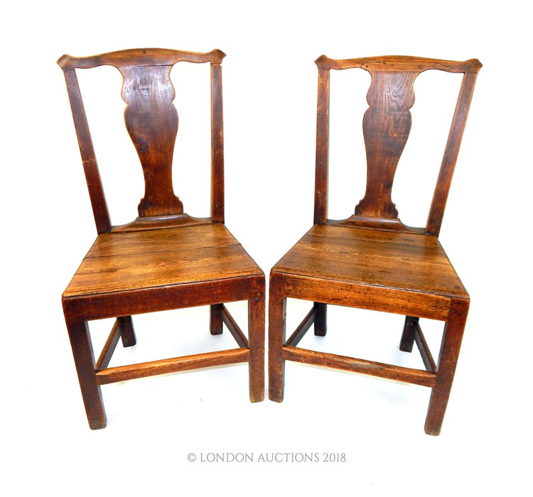 A pair of Georgian country oak side chairs