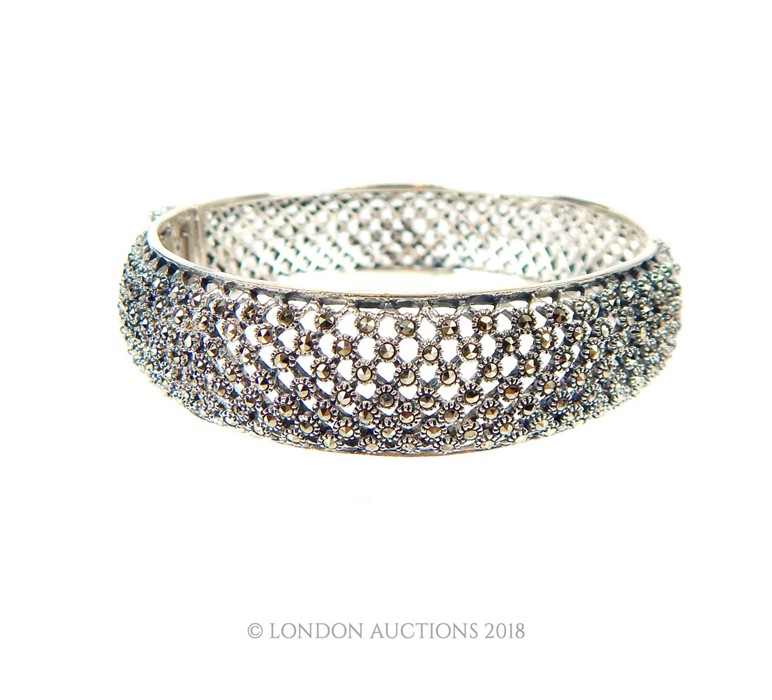 A Sterling Silver and Marcasite set bangle