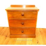 A turn of the last century small mahogany chest