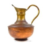 A large copper water jug