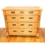 A Continental pine chest of four long drawers