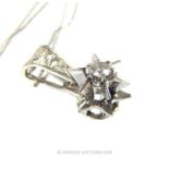 An 18 Carat White Gold Diamond Star Shaped Pendant Necklace