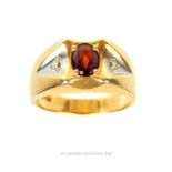 A Gentleman's 14 carat yellow gold garnet set ring