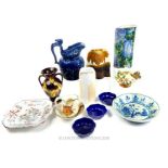 A collection of various pottery and porcelain items