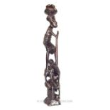 A carved African figural group