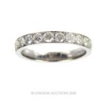 A Diamond Set Half Eternity ring