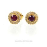 A Pair of 18 carat Rose Gold Diamond and Ruby Earrings.