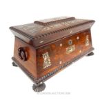 A large Victorian rosewood and mother of pearl inlaid tea caddy