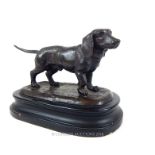 A Bronze figure of a Dog.