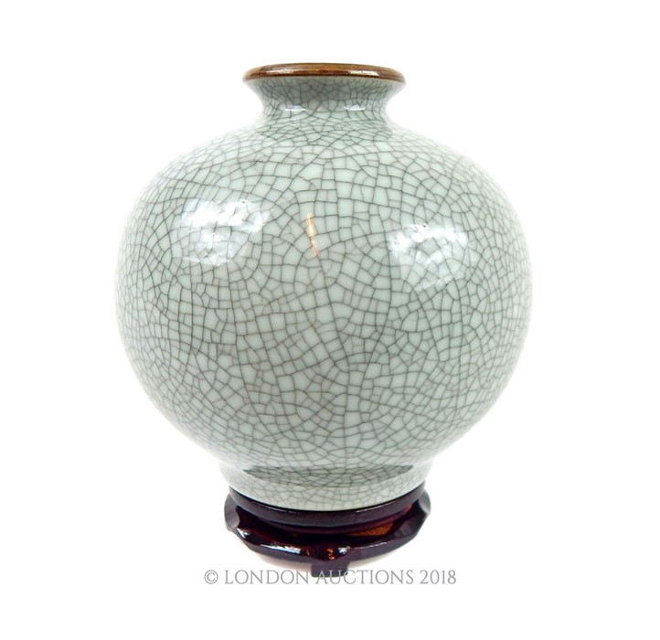 A Chinese Guan style celadon crackle glazed vase