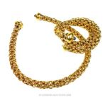 An Italian 18 Carat Yellow Gold Torque Necklace and Bracelet.