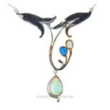 A silver and opalite art nouveau style necklace