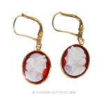 A pair of 14 carat Gold Cameo earrings.