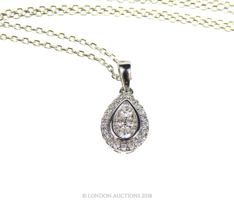 An 18 carat white Gold Diamond pendant necklace on Gold chain. - Image 2 of 3