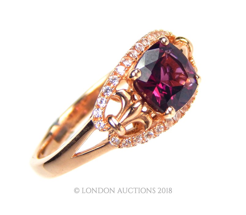 A 14 carat yellow gold Garnet and Diamond ring. - Image 3 of 3