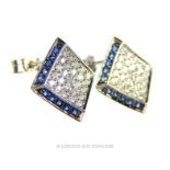 A pair of White Gold and Diamond pave set earrings.