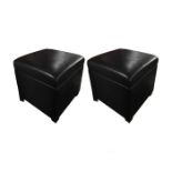 A pair of Black & Key ottoman stools.