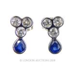 A Pair of Diamond and Sapphire Earrings.