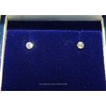 A Pair of Diamond stud earrings