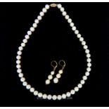 Akoya White Pearl Necklace with Akoya Pearl Earrings.