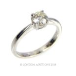 An 18ct White Gold Diamond Solitaire Ring.