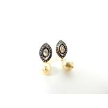 A Pair of High Carat Yellow Metal Diamond and Cultured Pearl Earrings