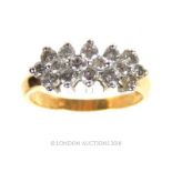 A 14 Carat White and Yellow gold sixteen round brilliant cut Diamonds totaling approximately 1