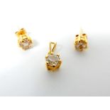 A Pair of High Carat Yellow Metal and White Sapphire Earrings and Pendant.